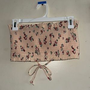 Strapless pink bathing suit top with flowers